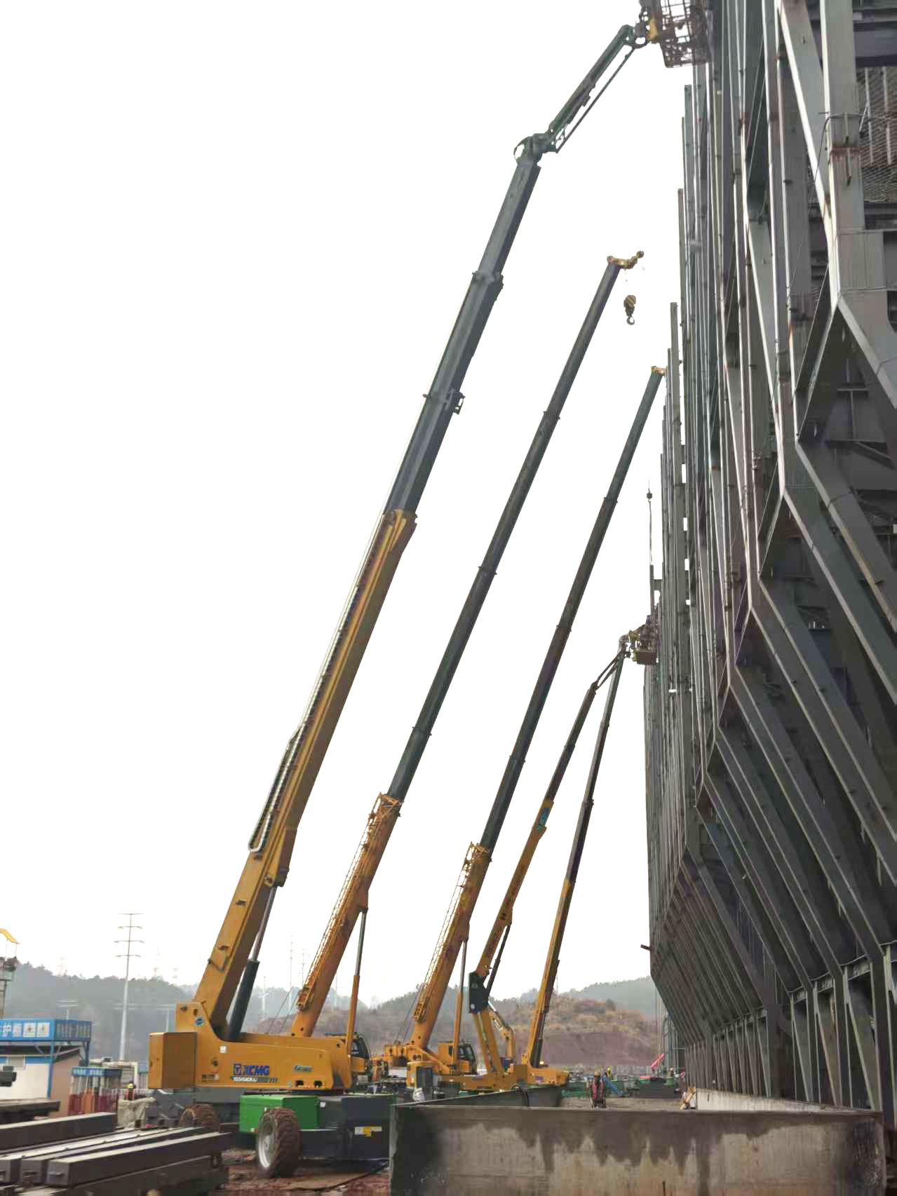 高空協(xié)同顯實(shí)力｜徐工裝備助陣銀聯(lián)黃山園區(qū)，外立面施工提質(zhì)增效